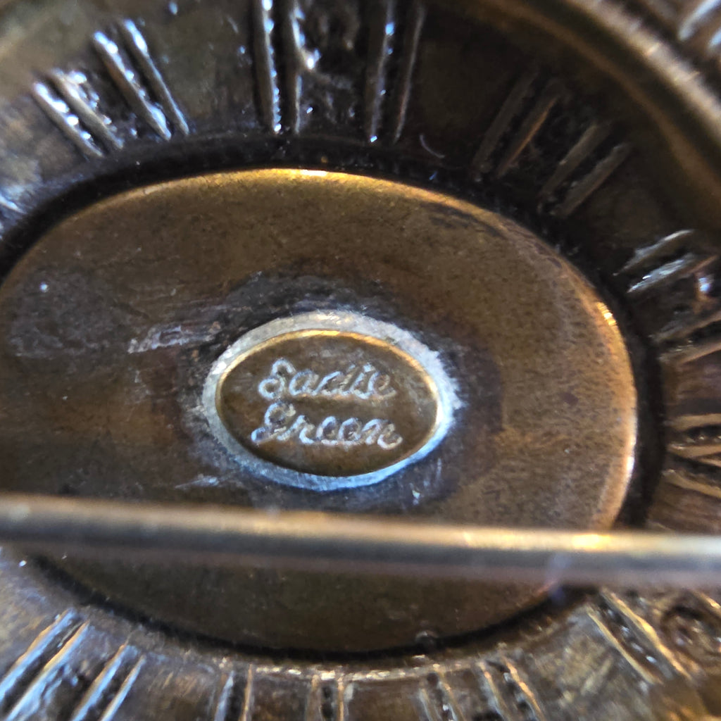 Vintage Sadie Green Art Deco Revival Stamped Brass Brooch, Purple Glass Center