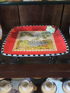 Zrike Eileen Tramonte whimsically designed serving platter featuring a frog scene.