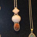 Sterling pendant w/3 stones on chain.