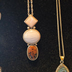 Sterling pendant w/3 stones on chain.