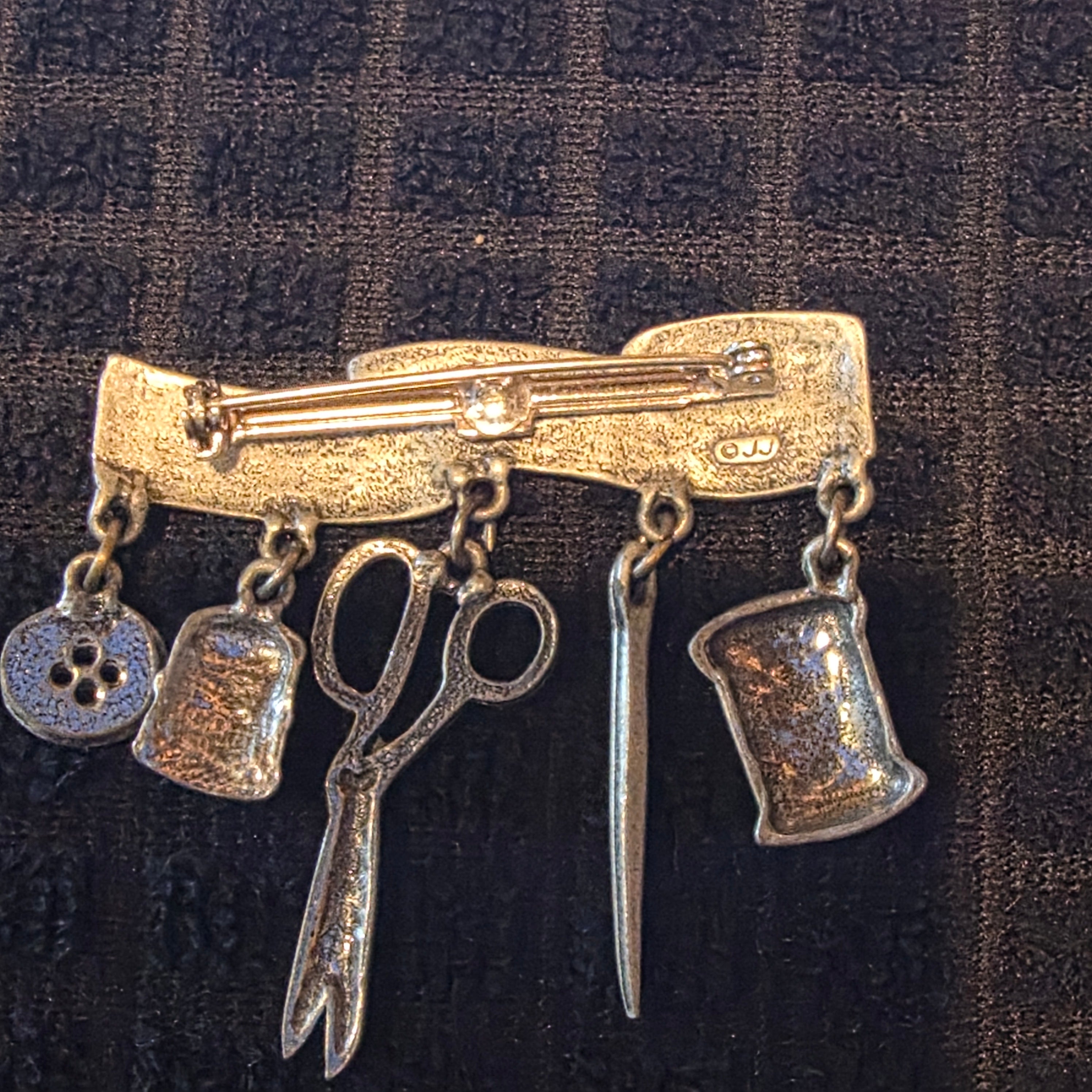 Pewter seamstress pin