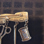 Pewter seamstress pin