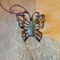 Vintage Filigree Butterfly Brooch with Central Gemstone