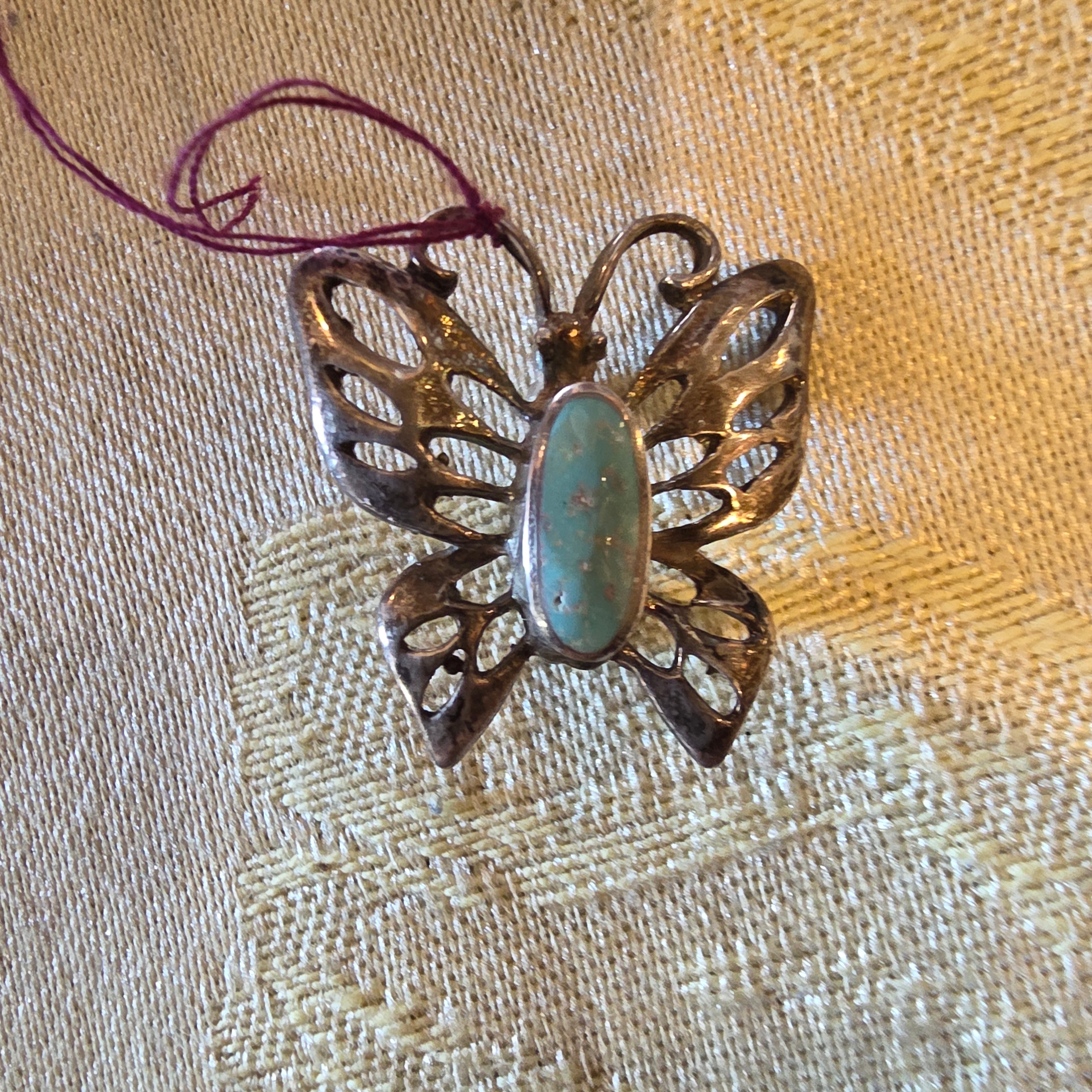 Vintage Filigree Butterfly Brooch with Central Gemstone