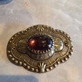 Vintage Sadie Green Art Deco Revival Stamped Brass Brooch, Purple Glass Center