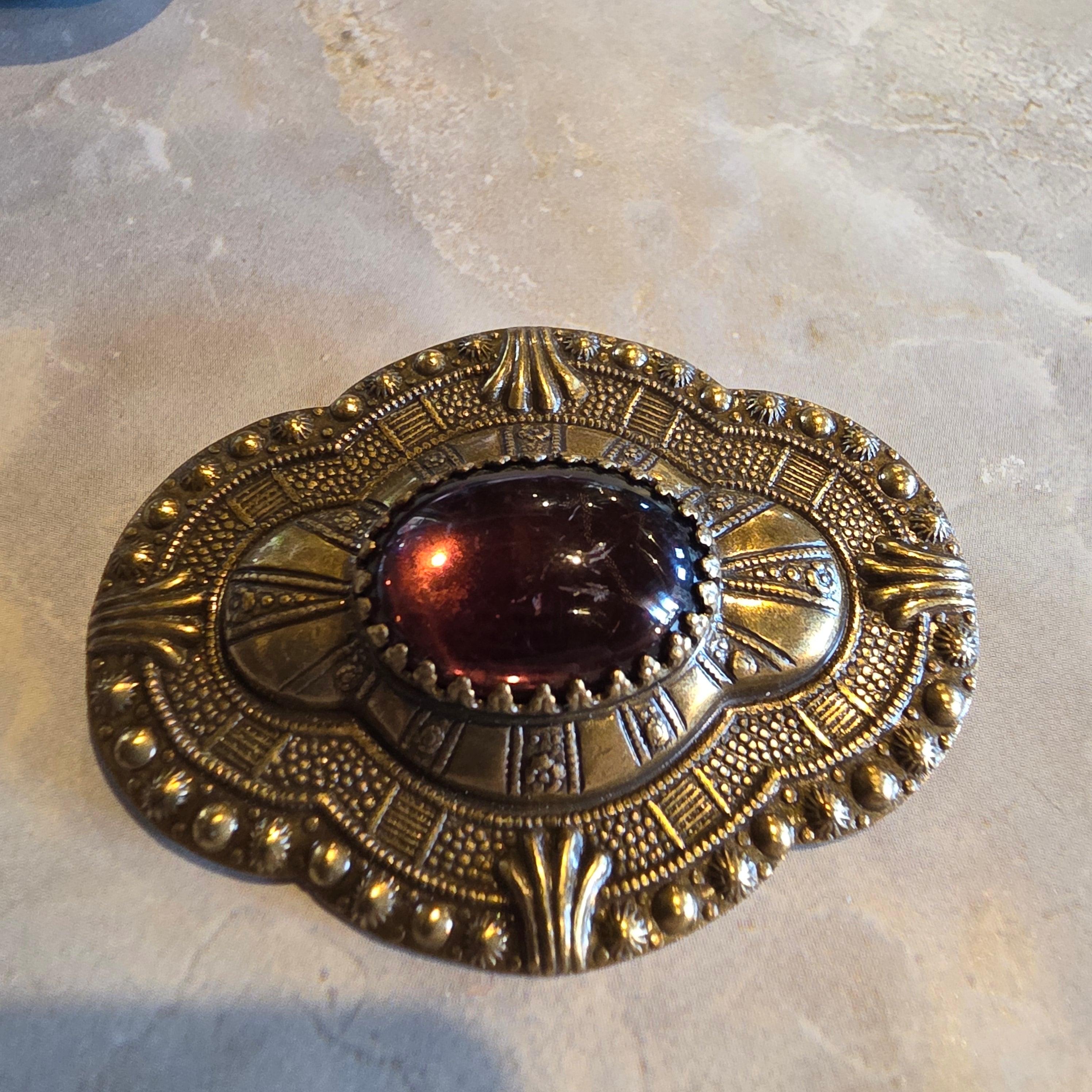 Vintage Sadie Green Art Deco Revival Stamped Brass Brooch, Purple Glass Center