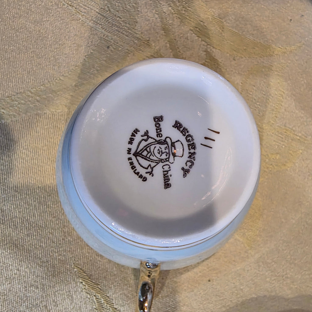 Vintage Regency Bone China cup & saucer gold filigree lace, light blue England