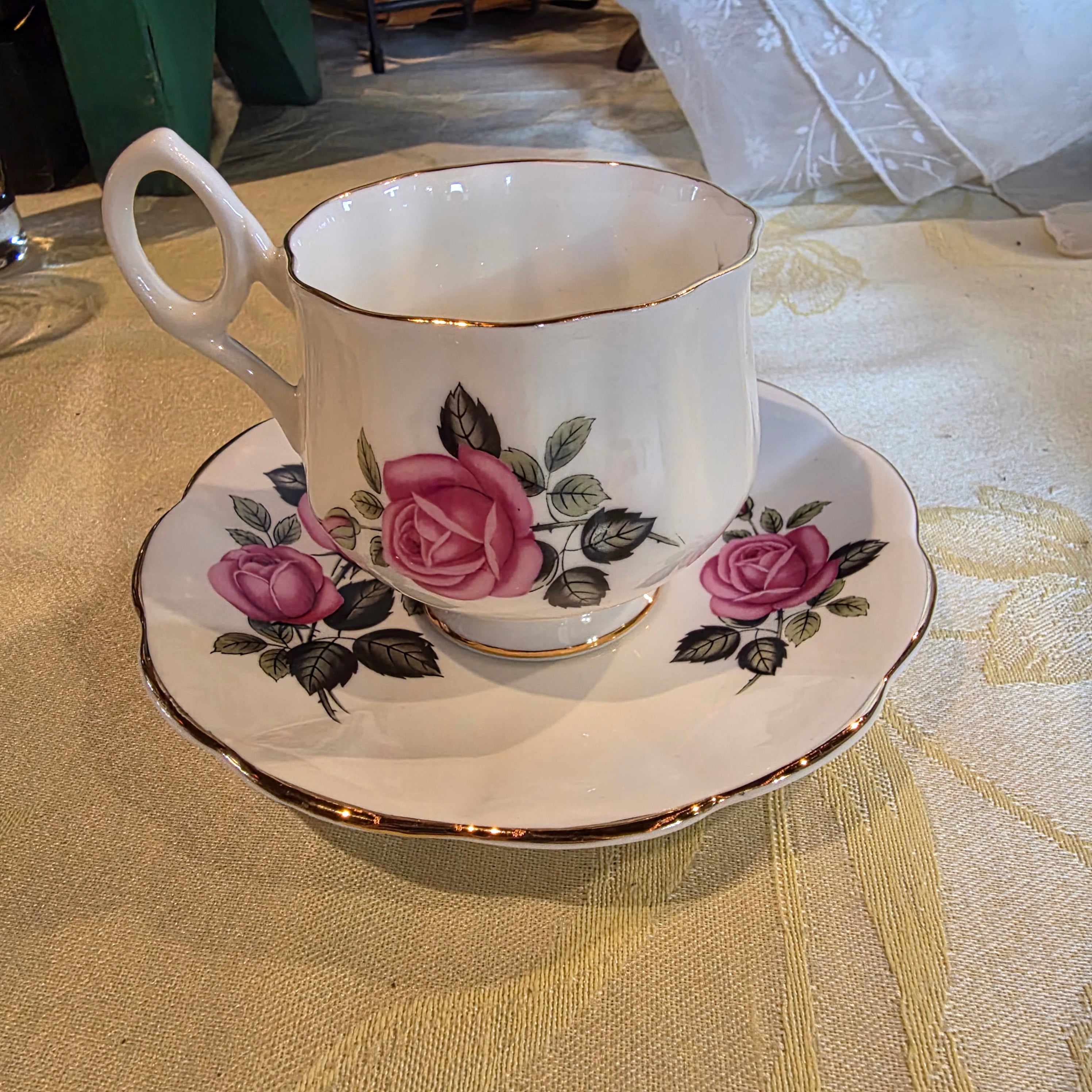 Vintage bone china cup & saucer made in England Pink Roses and gold trim