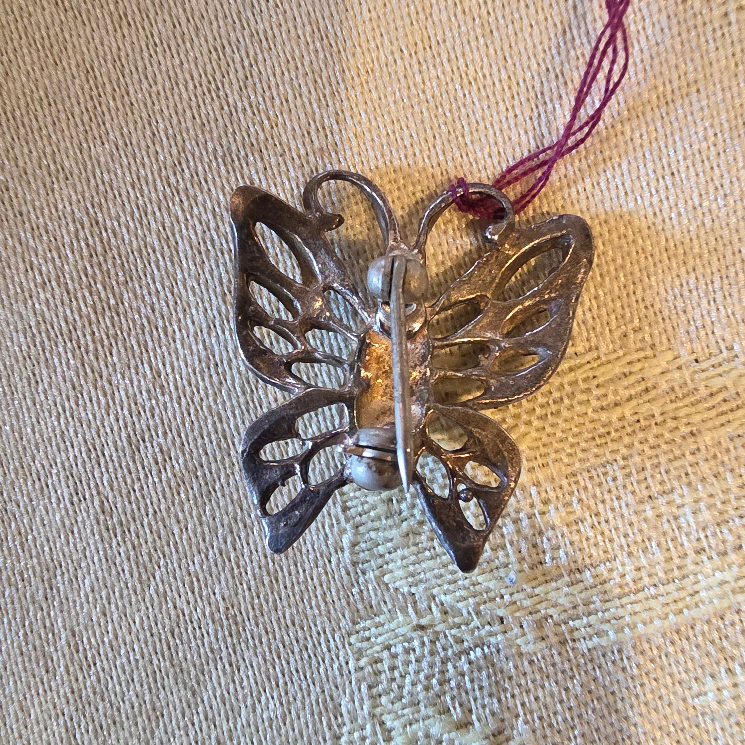Vintage Filigree Butterfly Brooch with Central Gemstone
