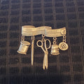 Pewter seamstress pin