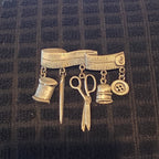 Pewter seamstress pin
