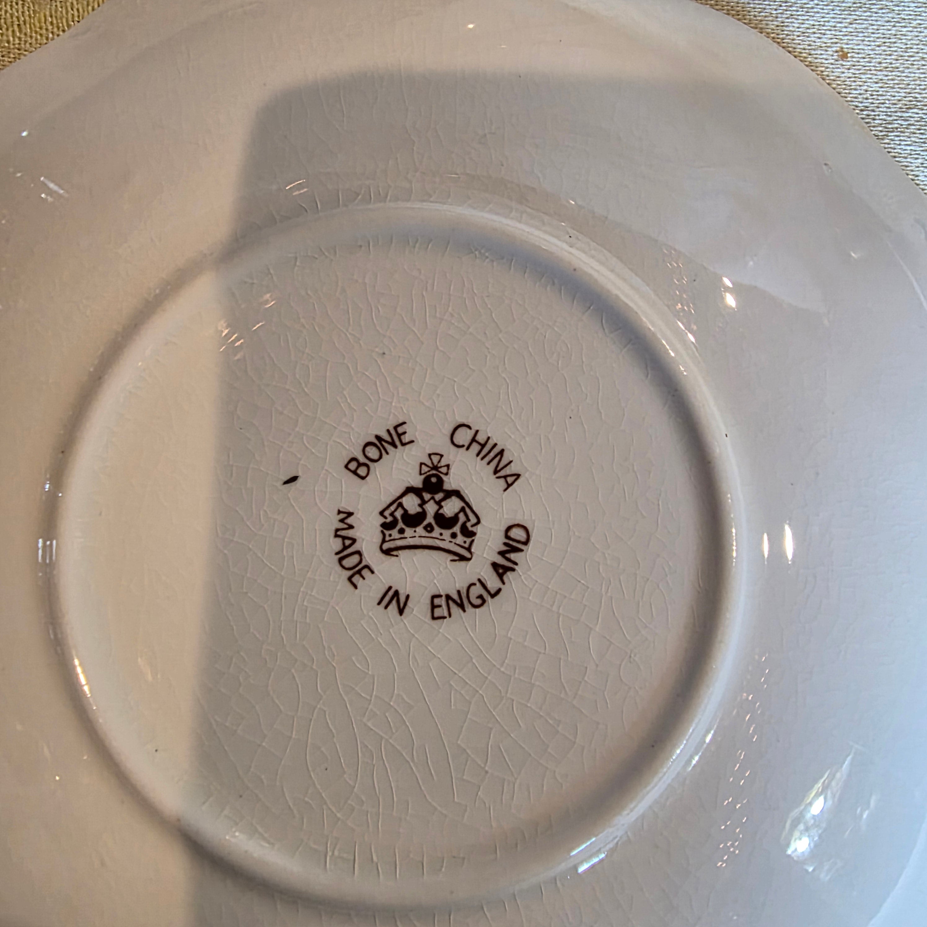 Vintage bone china cup & saucer made in England Floral Pattern and gold trim