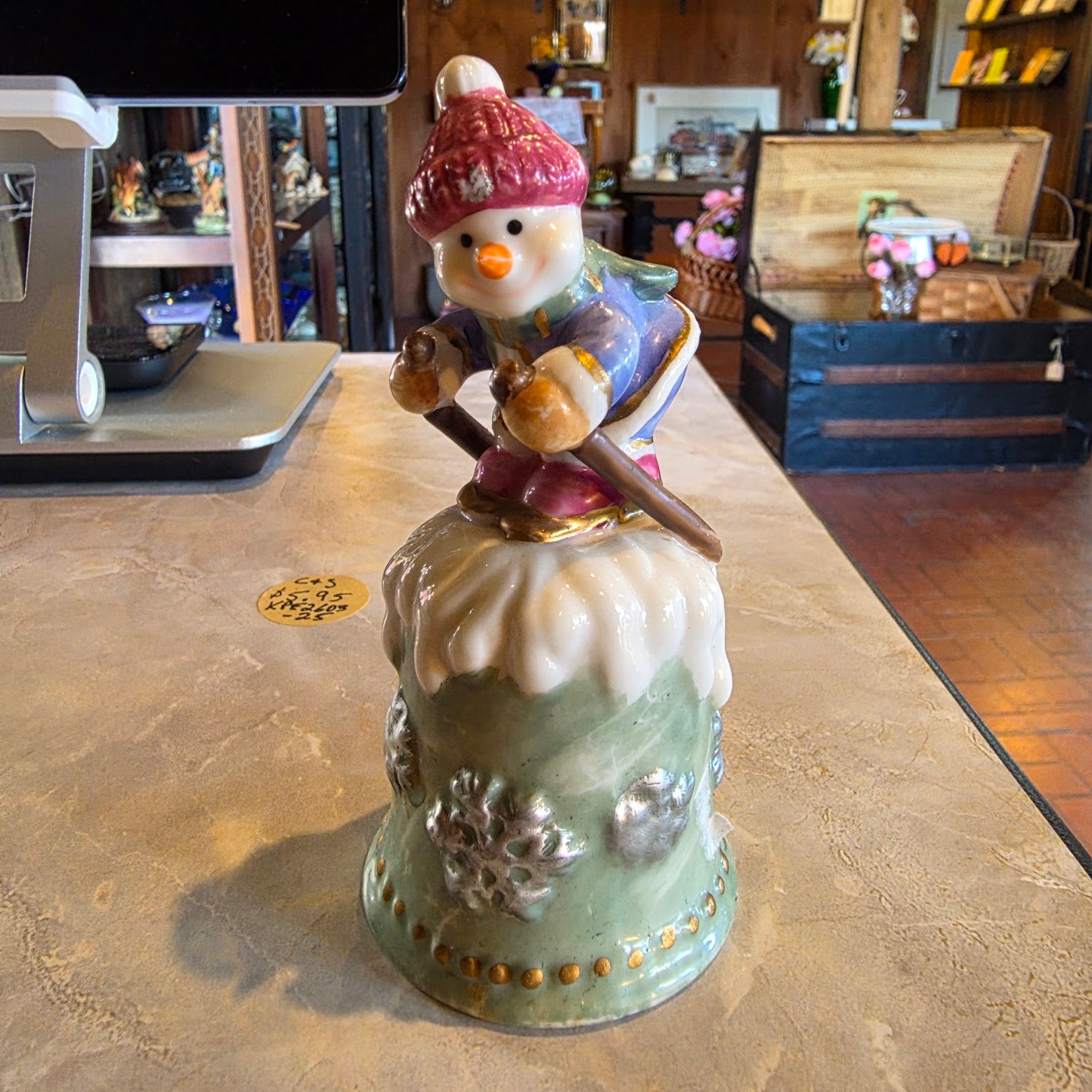 Vintage skiing snowman bell