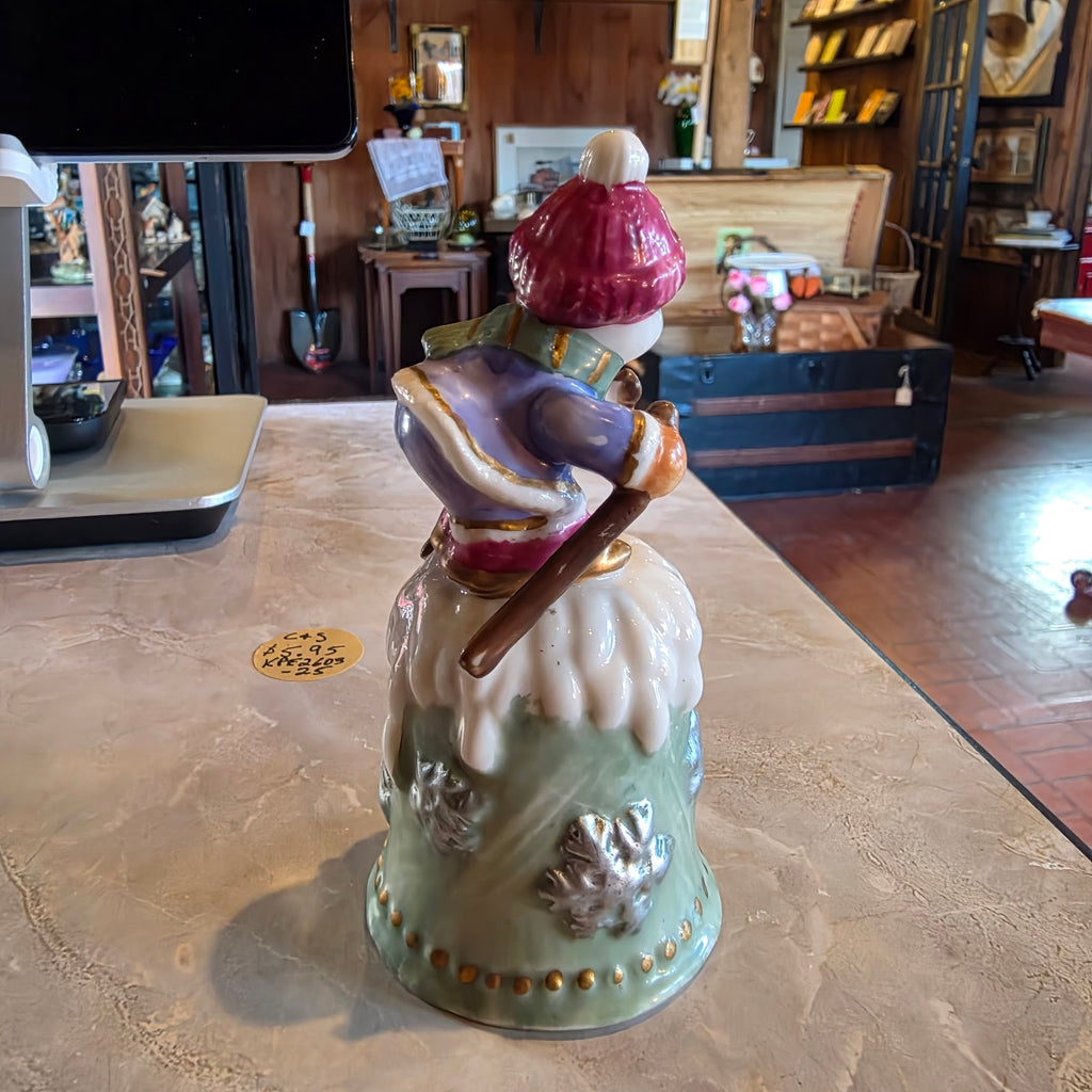 Vintage skiing snowman bell